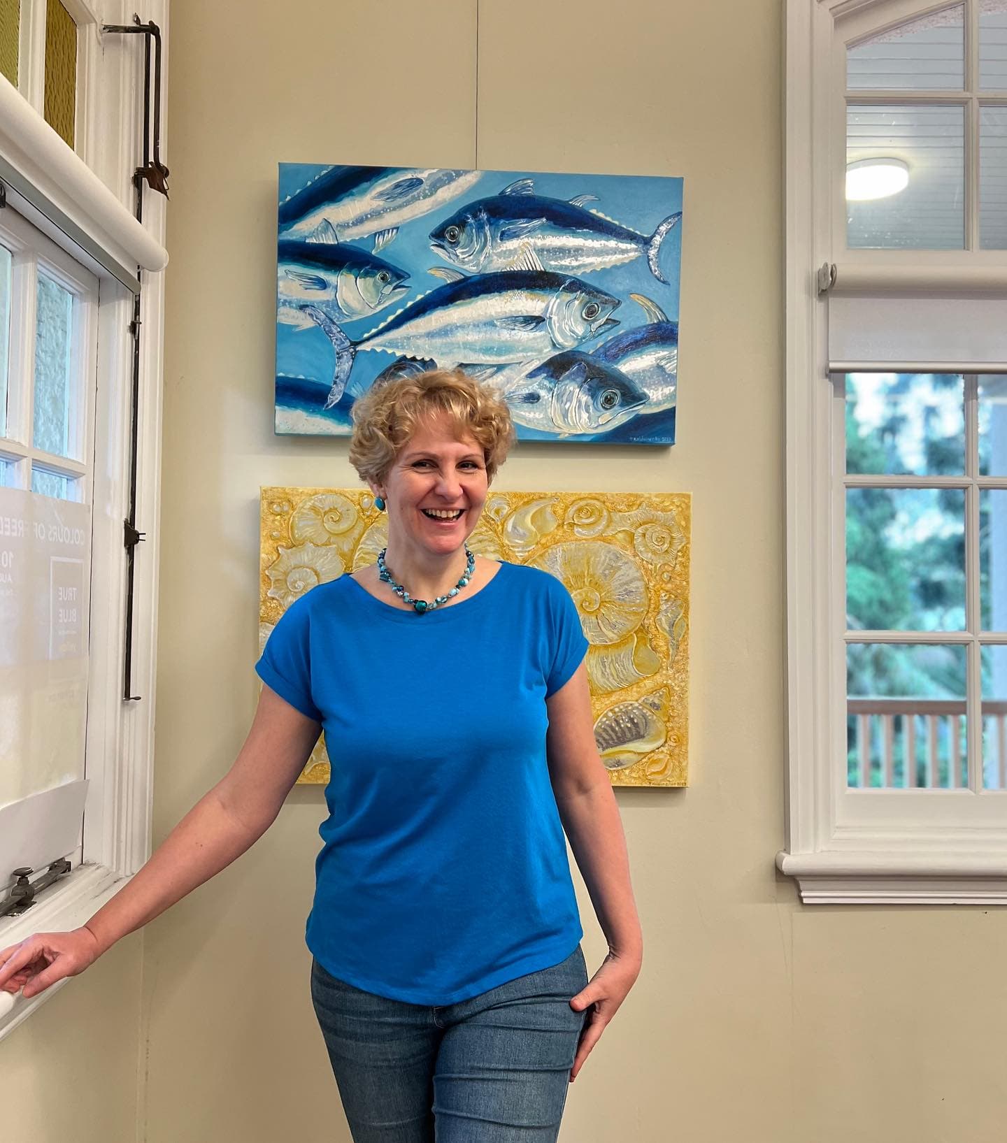 Blue and yellow artworks on the wall