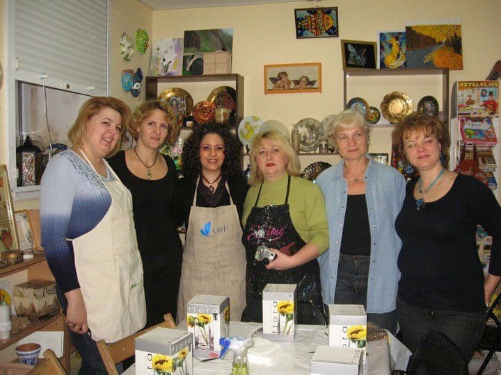 A group of participants with their creation