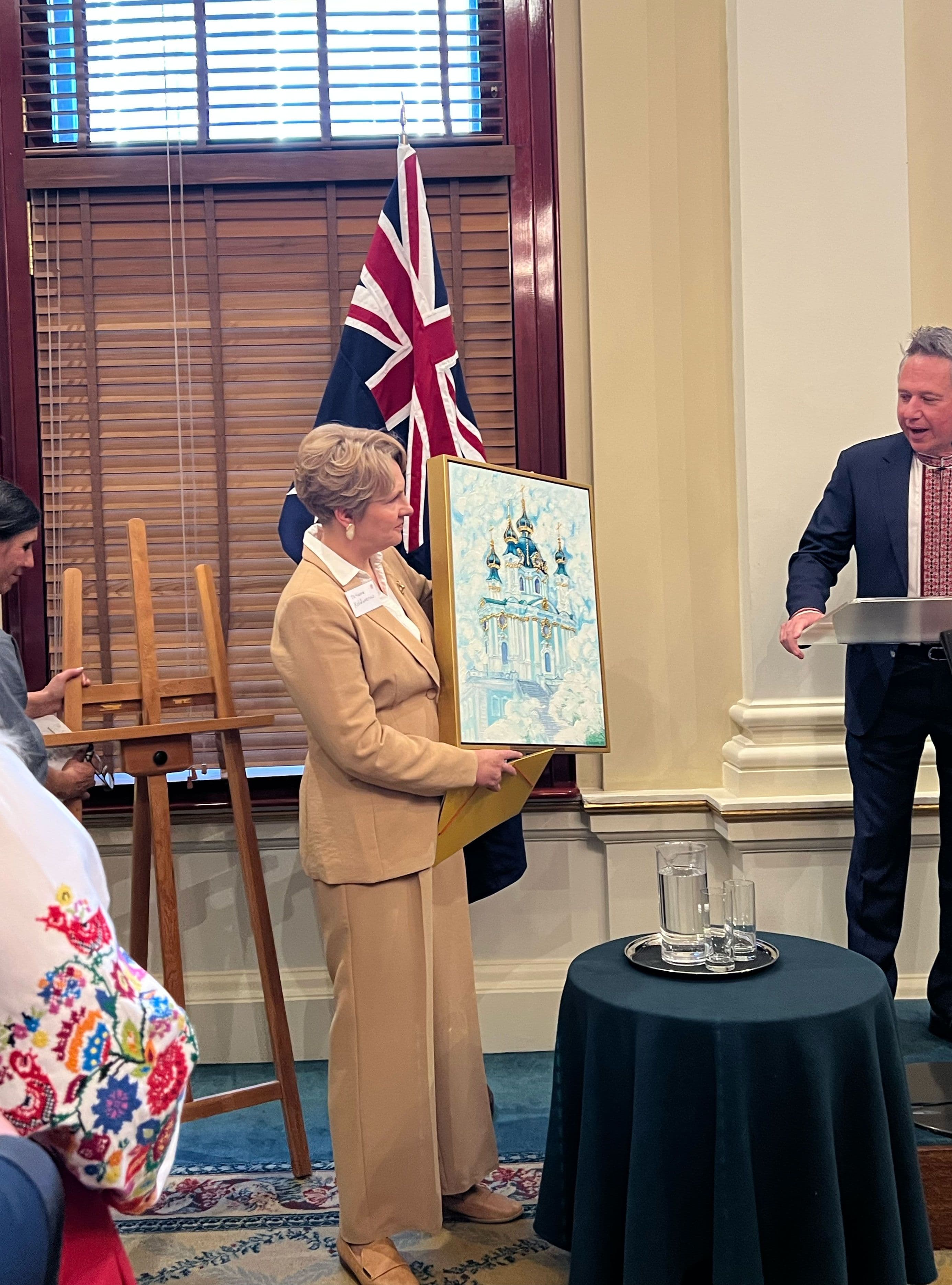 Artist presenting her artwork to City of Sydney Civic Collection