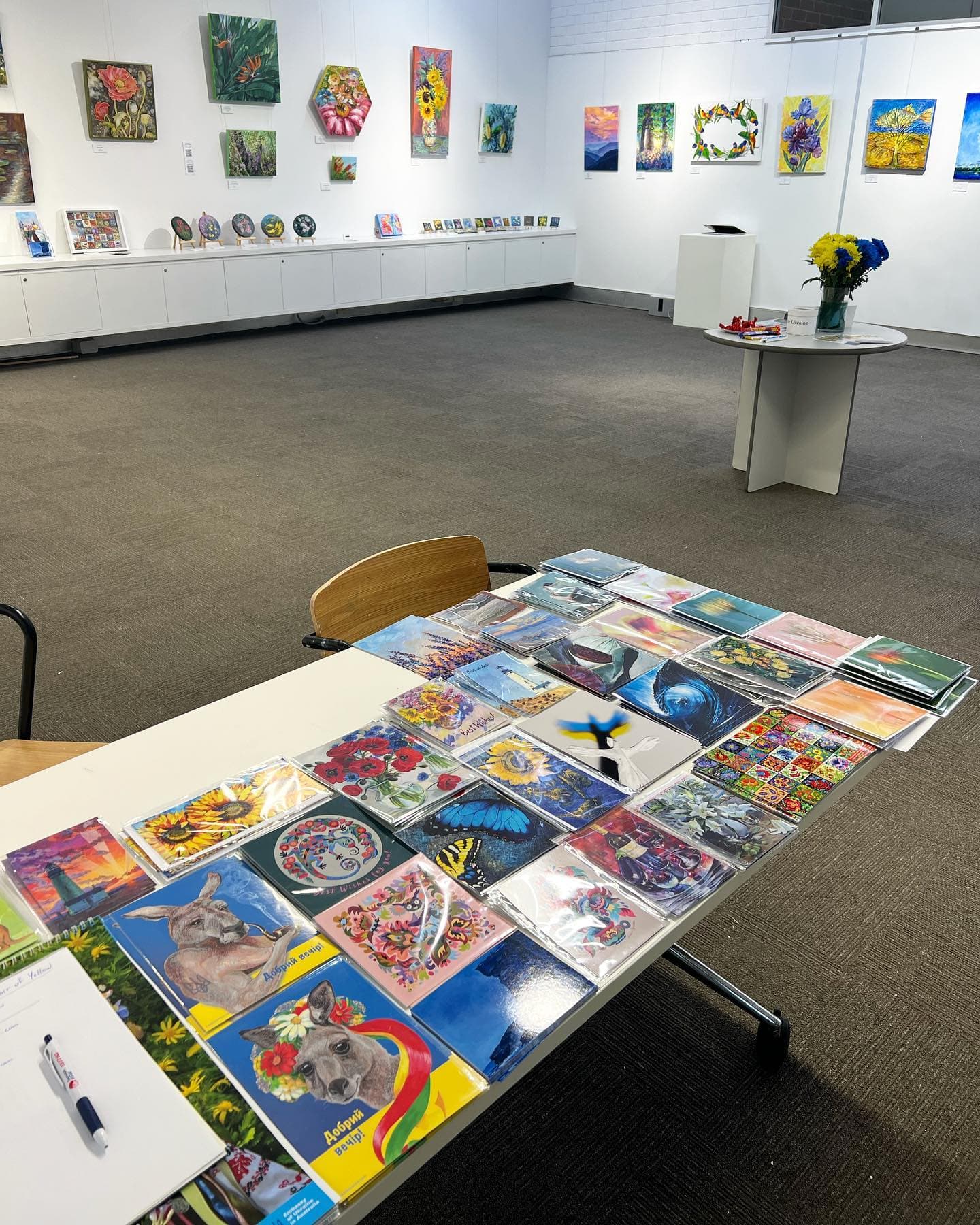 Exhibition walls and postcards for sale