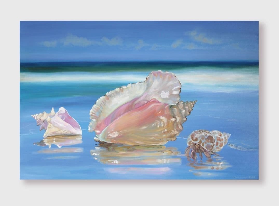 Three pink shells on the beach