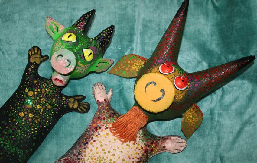 Paper-mache puppets of little devils