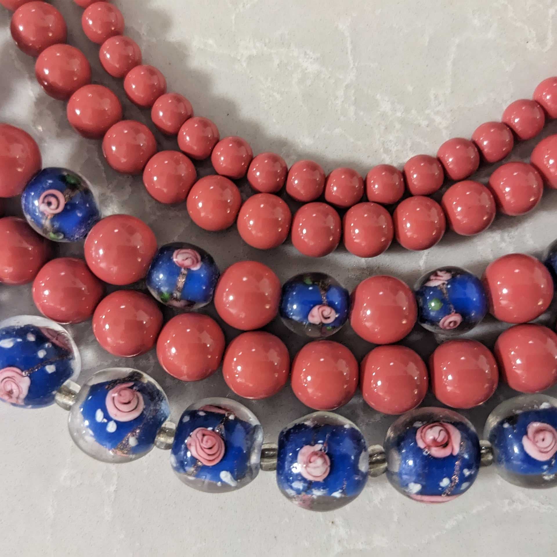 Pink and blue details of necklace