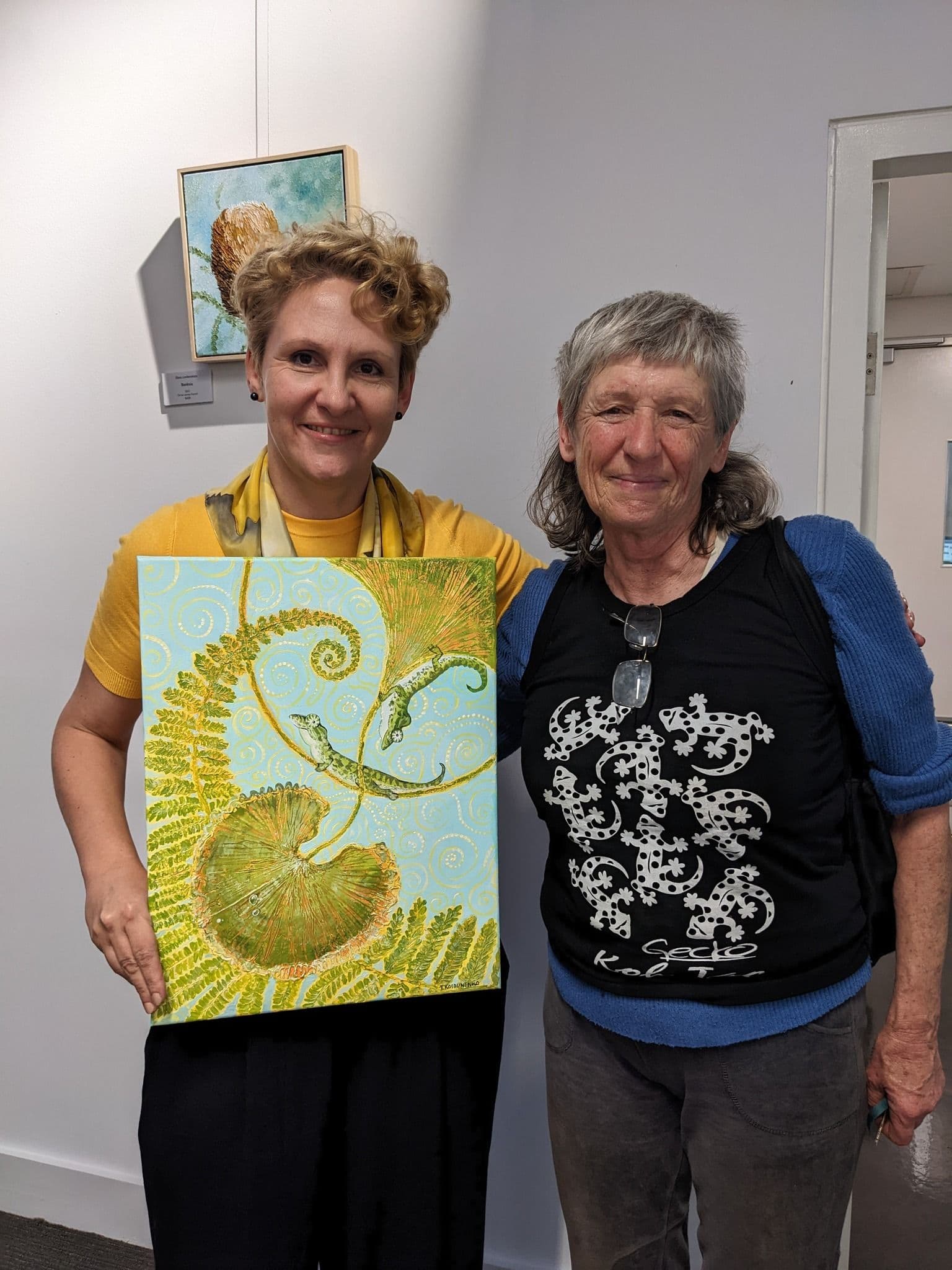 Tetiana Koldunenko and a collector who bought an artwork with lizards