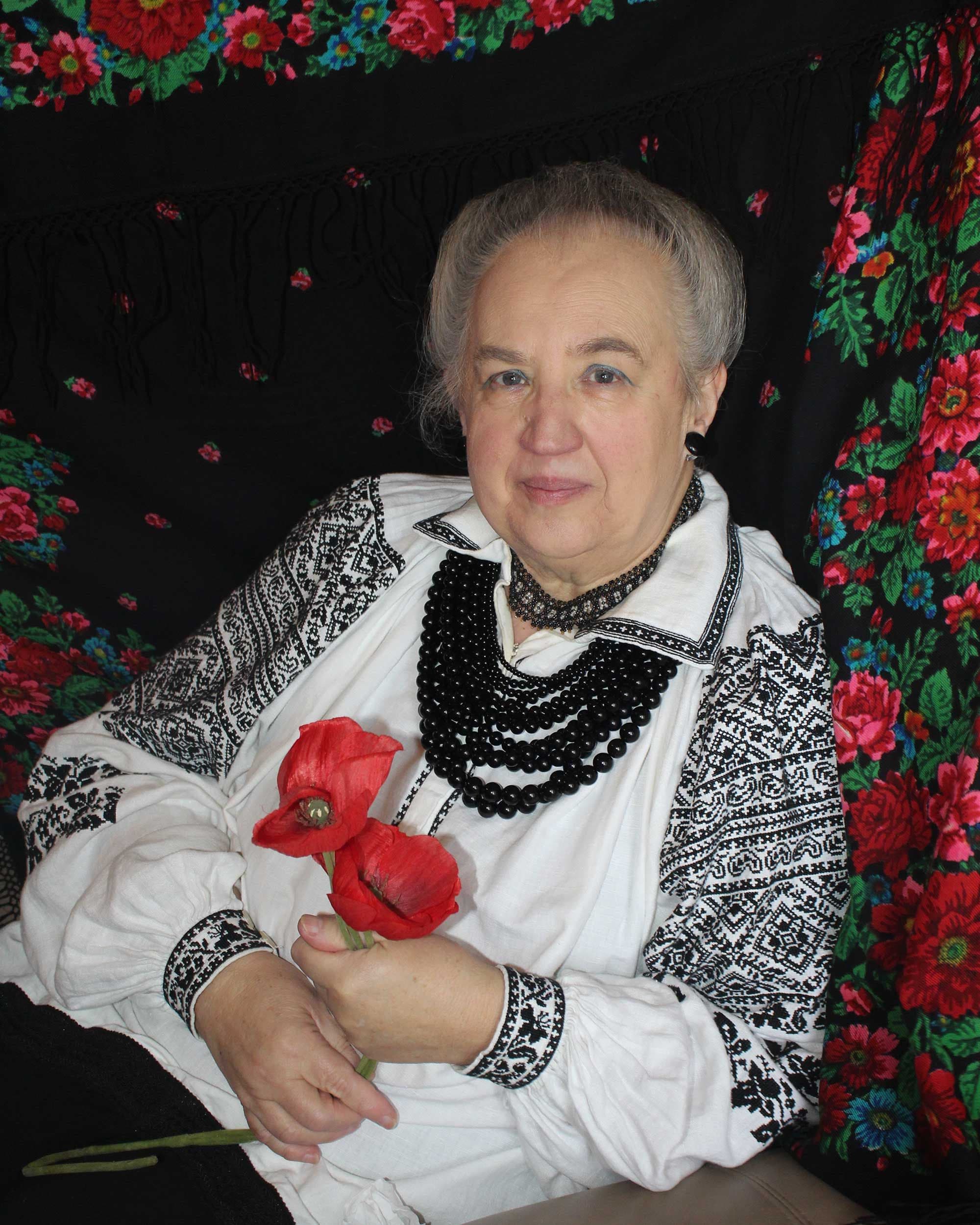 Portrait of Maricka Halaburda in embroidered blouse from Sokal region Ukraine