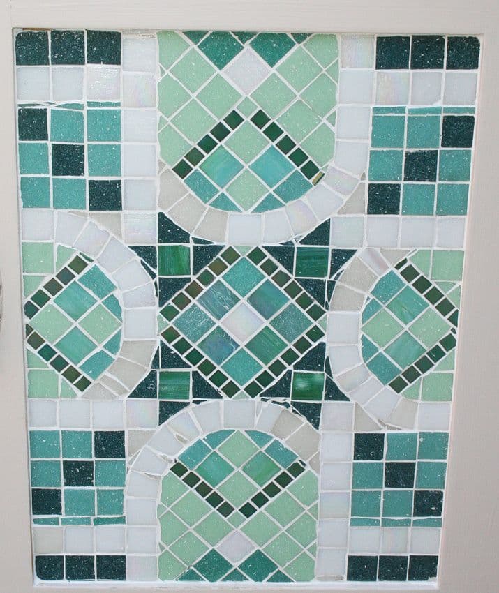 Green mosaic of the side table door